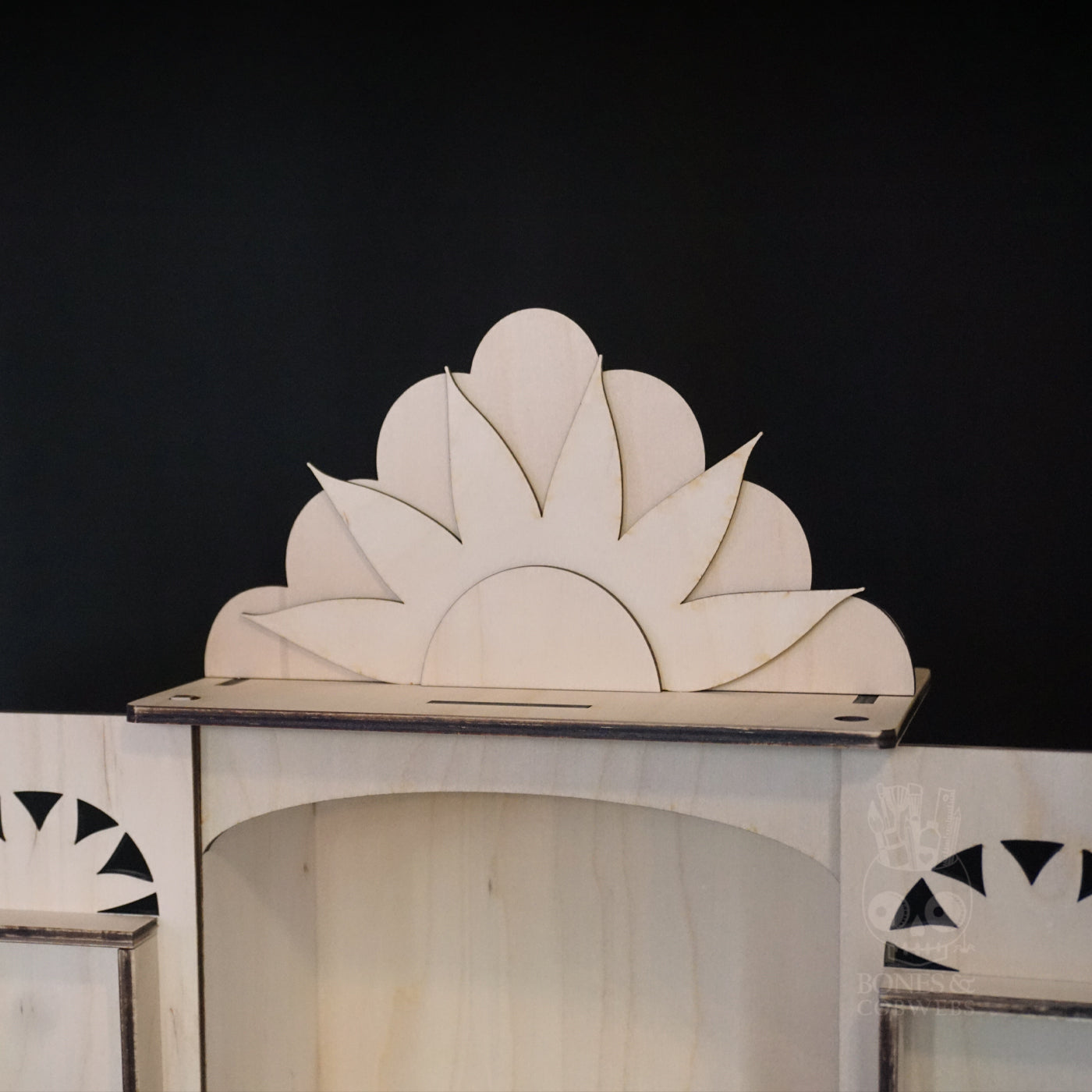 Close up of wooden nichos top design on a black background