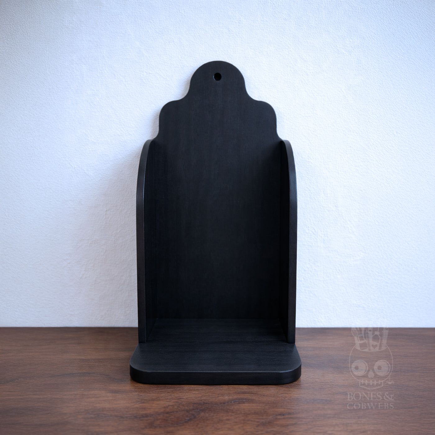 Ebony Stained Wooden Altar on a wooden surface with a white backgro