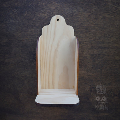 Wooden product display stand on a dark textured background