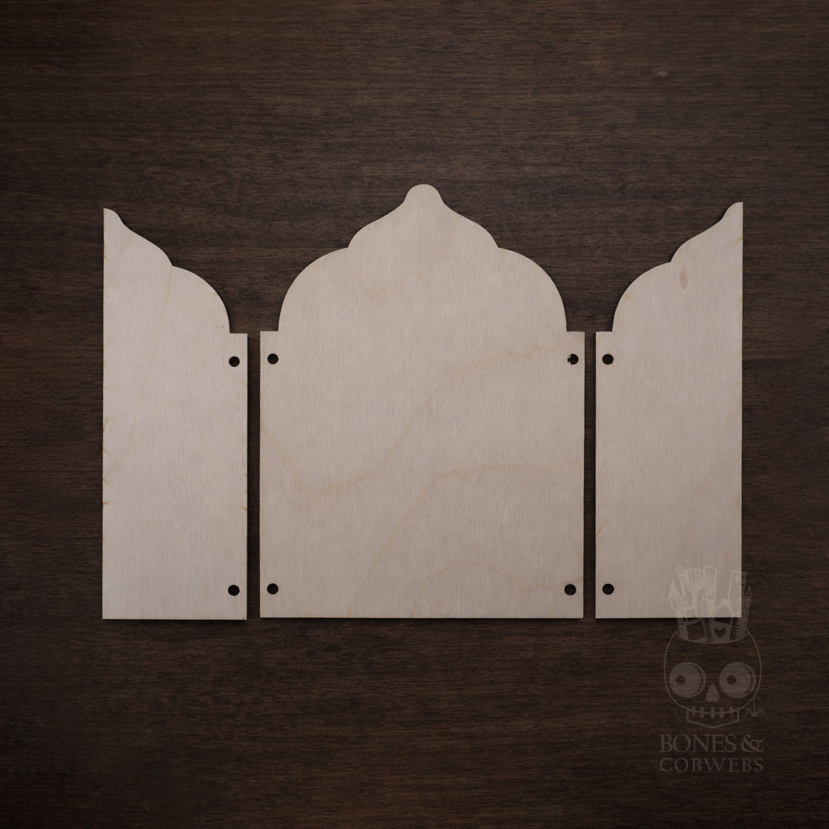 Wooden decorative panel with arched design on a dark brown background
