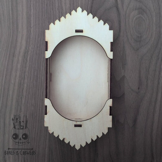 Decorative wooden shadwo box on a wooden background